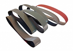 A set of grinding belts for sharpening knives at the ADEMS Tesar belt-grinding machine (grinder)